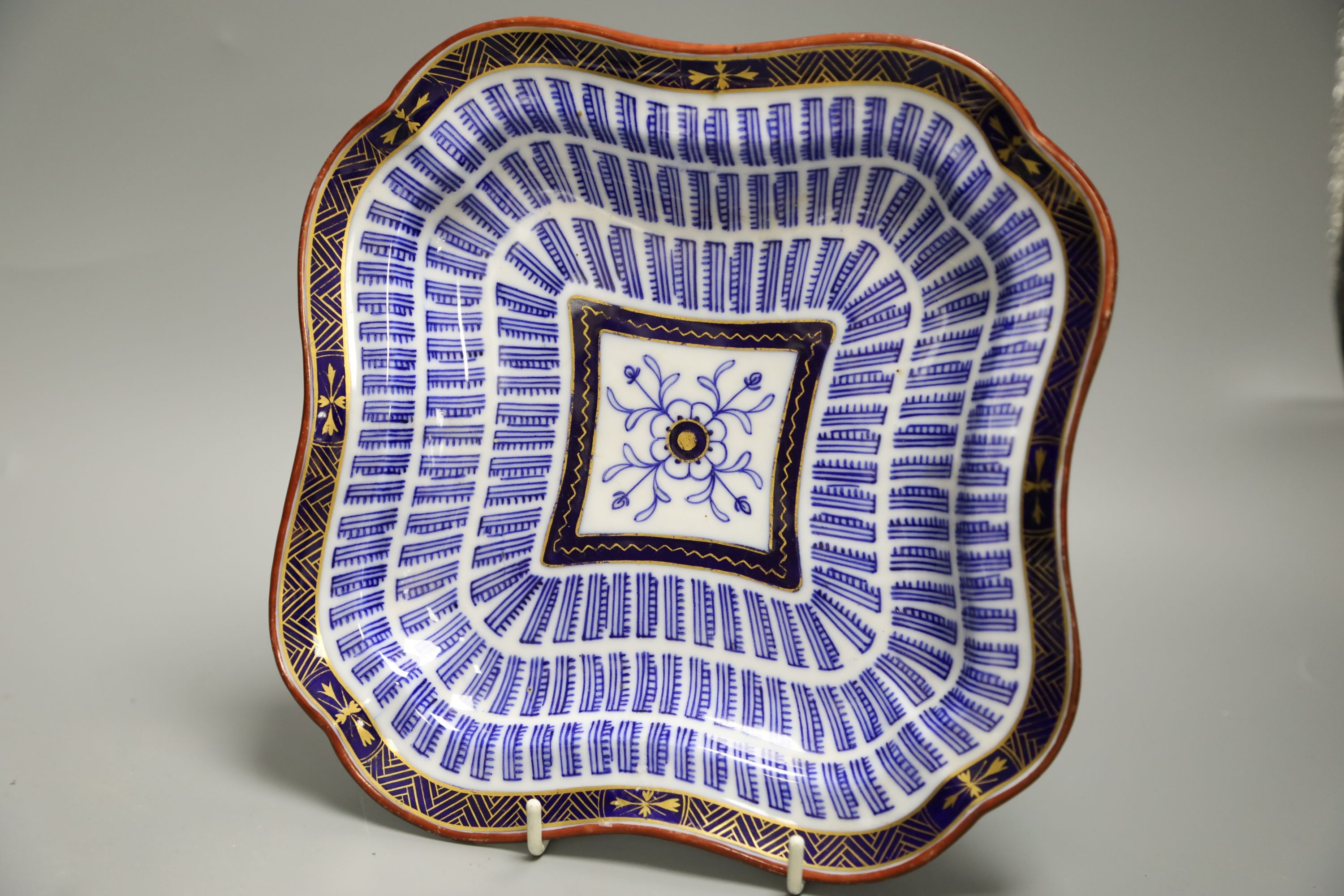 An 18th century Worcester square shaped dish with the Music pattern, 24cm, and a Worcester Flight period bowl